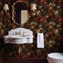 Dark moody floral wallpaper with cream peonies, coral lilies, berries and green foliage on chocolate brown