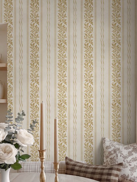 Gold and white wallpaper with antique gold leafy sprig stripes on parchment cream
