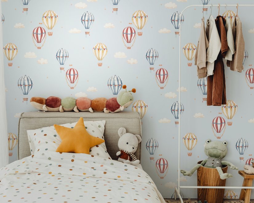 Hot air balloon wallpaper with watercolor balloons, ivory clouds and peach gold stars on pale powder blue