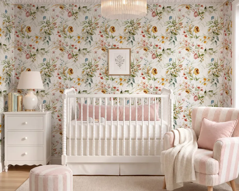 Watercolour floral wallpaper with sage leaves, blush and ochre flowers on a white ground
