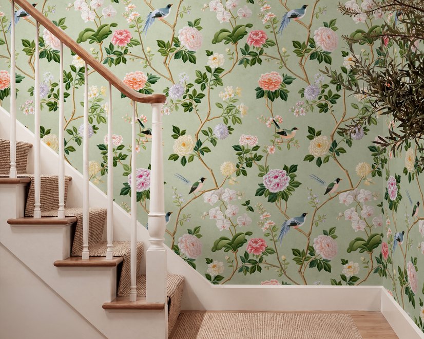 Celadon-sage chinoiserie wallpaper with blue-grey birds, tan branches, pink peonies and white orchids