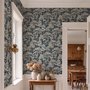 Navy wallpaper with warm ivory and taupe grey toile tree repeat on deep slate blue ground