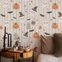 Cute autumn wallpaper with white ghosts, orange pumpkins, black bats and sage striped background