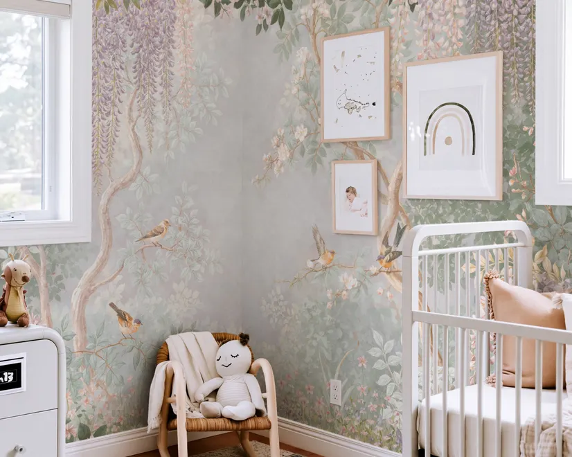 Watercolour nature wallpaper with lilac wisteria, pale trees, sage foliage and small songbirds around a misty clearing