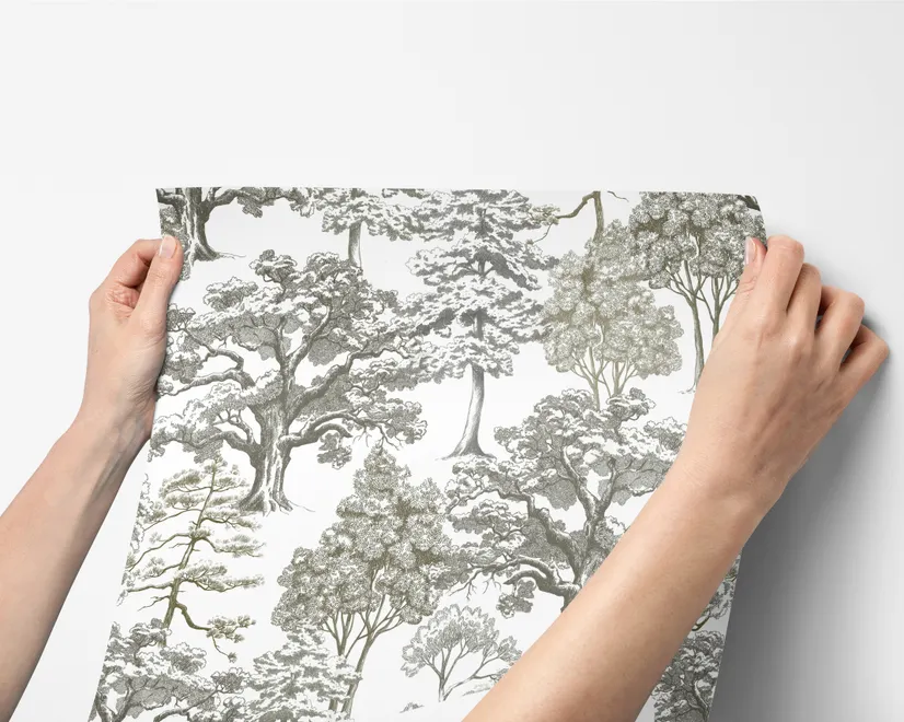 Monochrome wallpaper with grey tree toile on a clean white ground