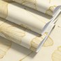 Ginkgo leaf wallpaper with ochre-gold linework on warm ivory and cream parchment ground