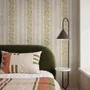 Gold and white wallpaper with antique gold leafy sprig stripes on parchment cream