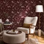 Pink butterflies wallpaper on a claret ground with cream flowers, moons, stars and spotted mushrooms.