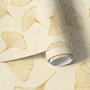 Ginkgo leaf wallpaper with ochre-gold linework on warm ivory and cream parchment ground