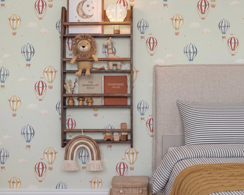 Watercolor blue wallpaper with hot air balloons, cream clouds and peach stars on pale sage green