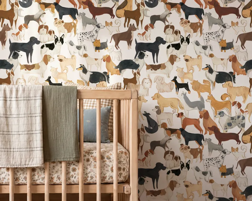 Zoomie kids wallpaper with painted dog breeds in tan, brown, black and grey on white