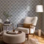 Cream colored wallpaper with denim blue geometric totem stripe repeat on a linen texture ground