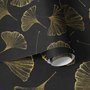 Black wallpaper with antique metallic gold ginkgo leaves on a mottled charcoal ground