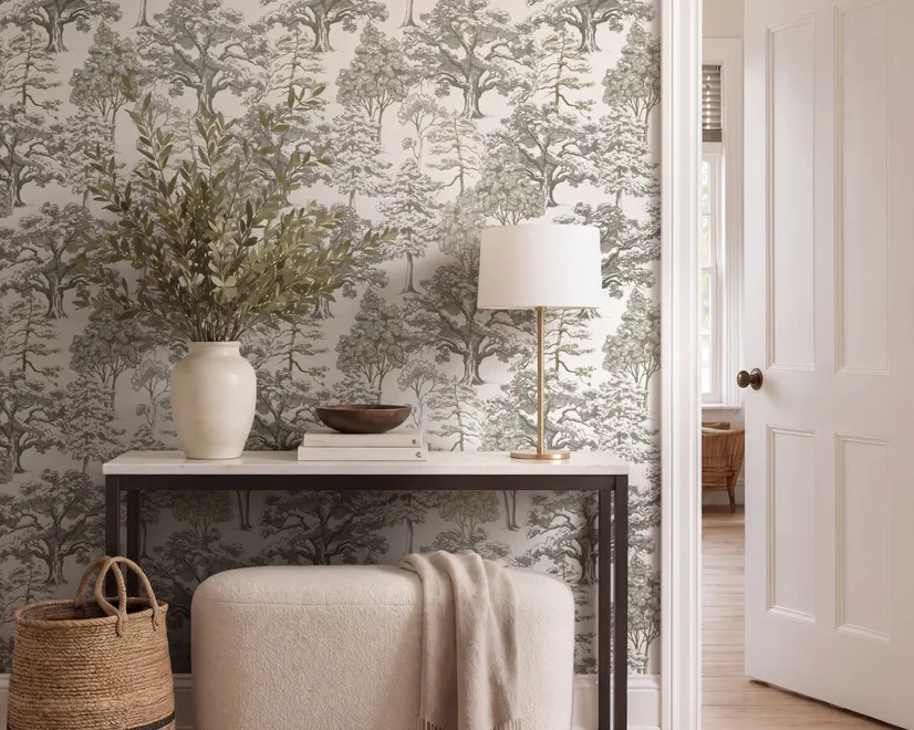 Monochrome wallpaper with grey tree toile on a clean white ground