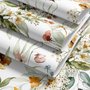 Watercolour floral wallpaper with sage leaves, blush and ochre flowers on a white ground