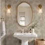 Abstract taupe and greige wallpaper with creamy white oval brush marks in flowing currents