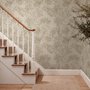 Abstract taupe and greige wallpaper with creamy white oval brush marks in flowing currents