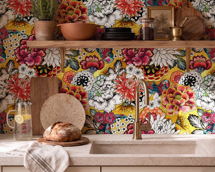 Floral and fish wallpaper with coral blooms, teal fish and black white flowers on metallic mustard-gold ground