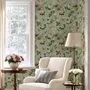 Celadon-sage chinoiserie wallpaper with blue-grey birds, tan branches, pink peonies and white orchids