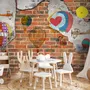 Hot Air Balloon with Young People on Brick Wallpaper Mural
