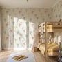 Watercolor blue wallpaper with hot air balloons, cream clouds and peach stars on pale sage green
