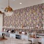 Bold wallpaper for powder room with pop art female faces, pink flowers, black comic panels, mustard, teal and fuchsia details