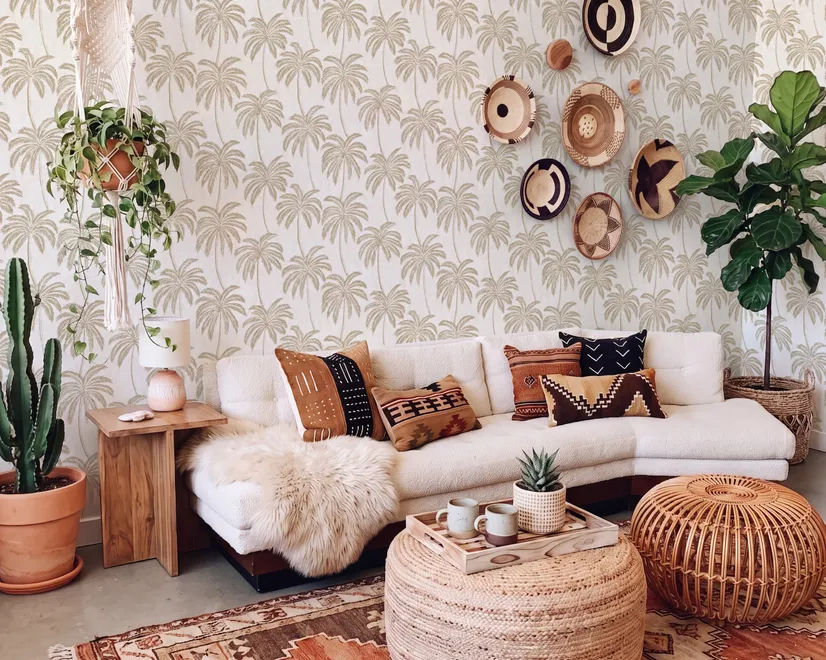 Muted sandy taupe palm trees and pale foliage on a creamy ivory ground tropical wallpaper