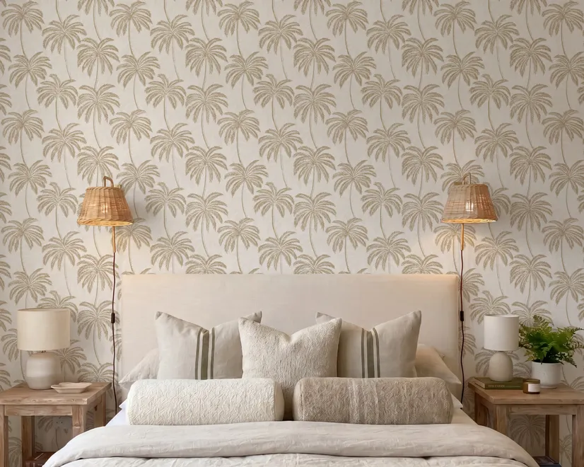 Muted sandy taupe palm trees and pale foliage on a creamy ivory ground tropical wallpaper