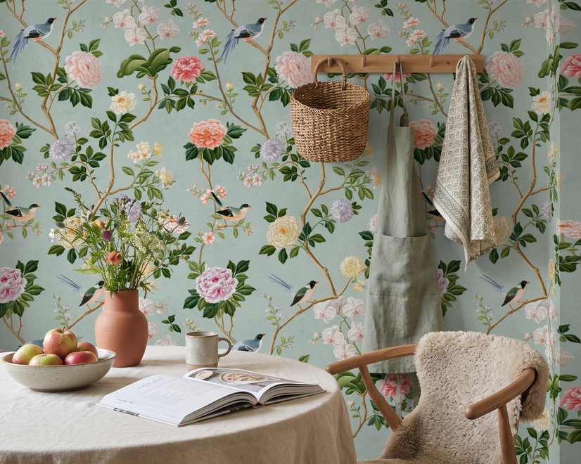 Chinoiserie wallpaper with peach birds, orchids and peonies on a pale duck egg blue ground