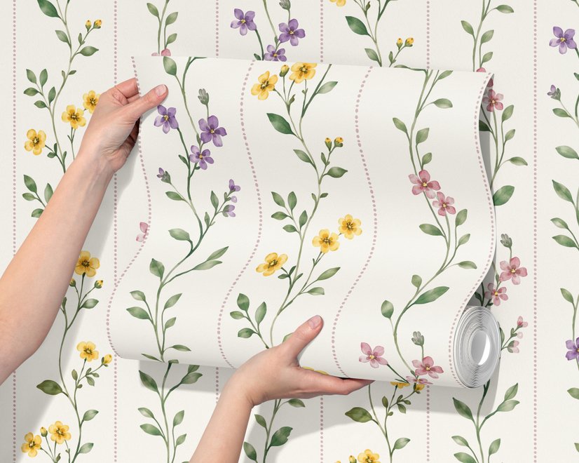 Cute floral wallpaper with green vine trails and pink, purple and yellow watercolor flowers on cream