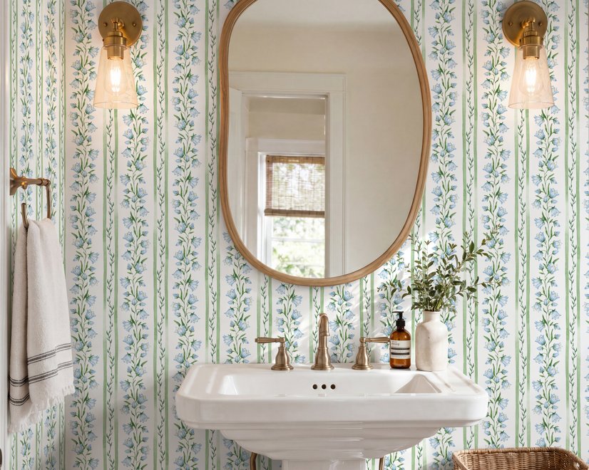 Blue floral stripe wallpaper with pale sky-blue bell flowers, green vines and sage bands on white