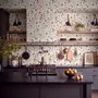 Cute spring wallpaper with pressed ivory, pink, blue and yellow wildflowers on a white ground