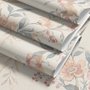 Pink chinoiserie wallpaper with watercolor flowers, blue-grey leaves and red berries on a cream linen-texture ground