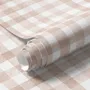 Soft brown wallpaper with pale beige gingham checks on a warm cream off-white ground