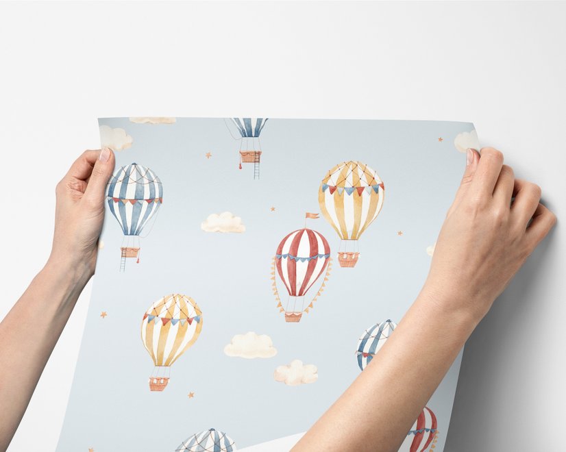 Hot air balloon wallpaper with watercolor balloons, ivory clouds and peach gold stars on pale powder blue