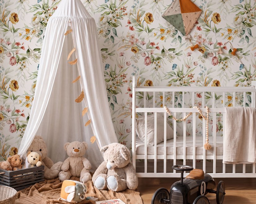Watercolour floral wallpaper with sage leaves, blush and ochre flowers on a white ground