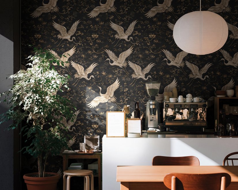 Ivory cranes and antique gold lotus flowers on charcoal-black Japanese lotus wallpaper