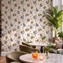 Bar area wallpaper with hand drawn cocktails, liquor bottles, citrus and fruit bowls on warm cream