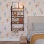 Hot air balloon nursery room wallpaper with watercolour balloons, clouds and stars on a soft blush-pink ground