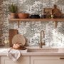 Monochrome wallpaper with grey tree toile on a clean white ground