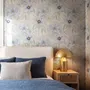 Blue floral wallpaper with watercolour anemone blooms, mint sage leaves and yellow ochre centres on white