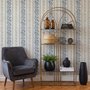 Blue wallpaper with indigo botanical stripework, pinstripes and dotted borders on warm cream parchment