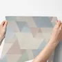Pastel abstract wallpaper with overlapping sky blue, blush, cream, sage and grey textured triangles
