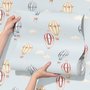 Hot air balloon wallpaper with watercolor balloons, ivory clouds and peach gold stars on pale powder blue
