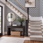 Cream colored wallpaper with denim blue geometric totem stripe repeat on a linen texture ground