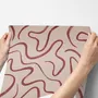 Burgundy-red looping contour lines on blush cream pink wallpaper mural