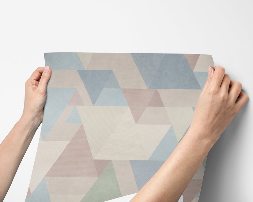 Pastel abstract wallpaper with overlapping sky blue, blush, cream, sage and grey textured triangles