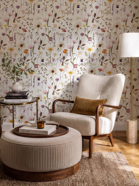 Cute spring wallpaper with pressed ivory, pink, blue and yellow wildflowers on a white ground