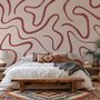 Burgundy-red looping contour lines on blush cream pink wallpaper mural