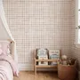 Soft brown wallpaper with pale beige gingham checks on a warm cream off-white ground